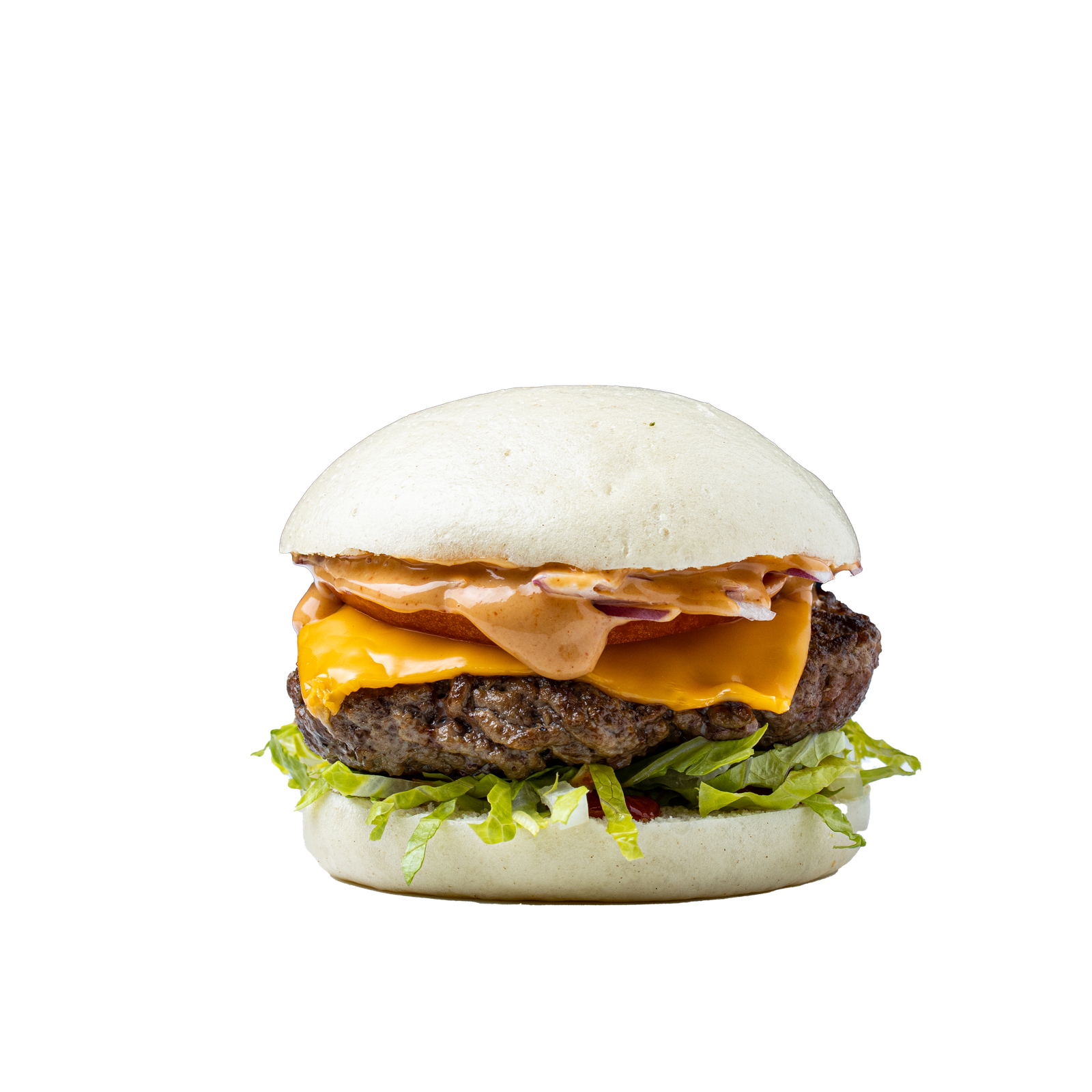 A bao cheeseburger with beef patty, melted cheese, sauce and shredded lettuce on a transparent background, cut-out product photography for a bao producer.
